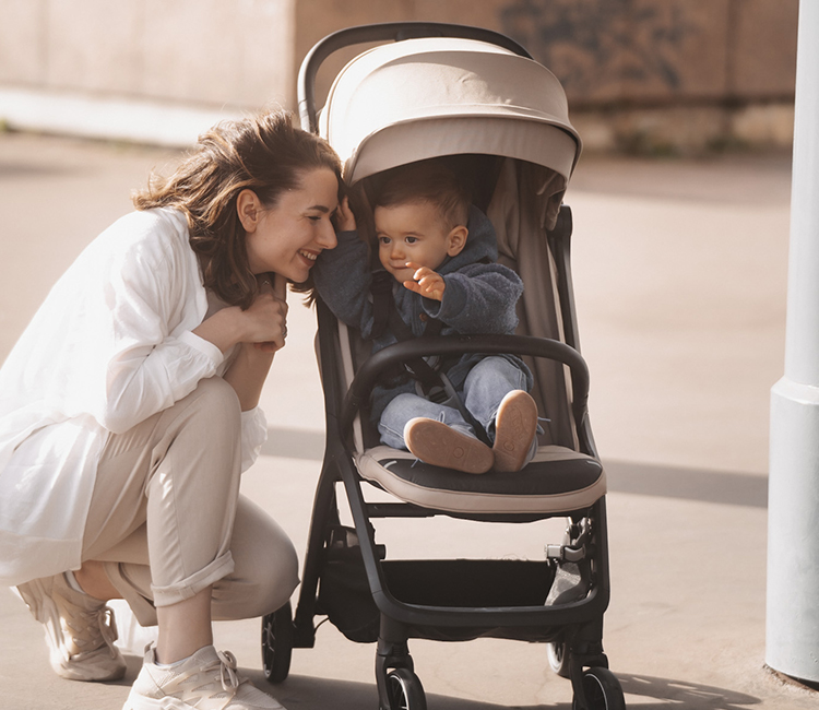 a-boy-in-a-NUBI-2-stroller-with-a-mom-next-to-him